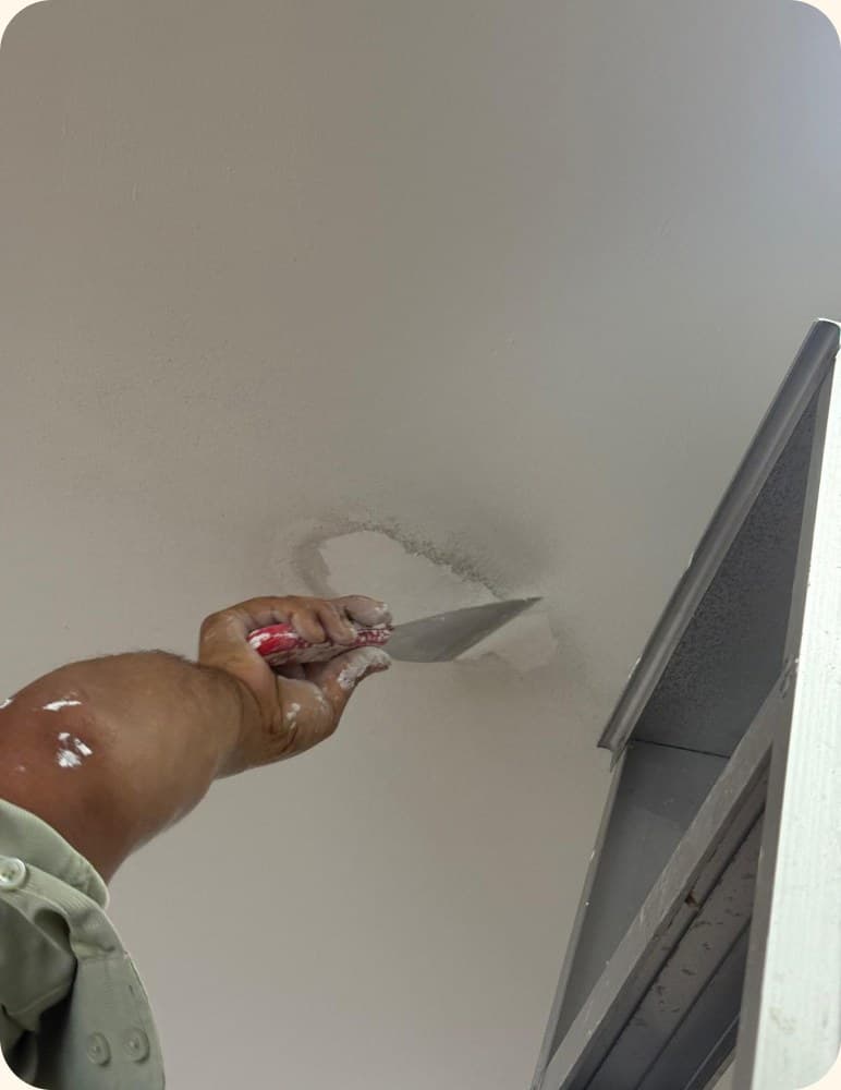 Patching and smoothing a ceiling
